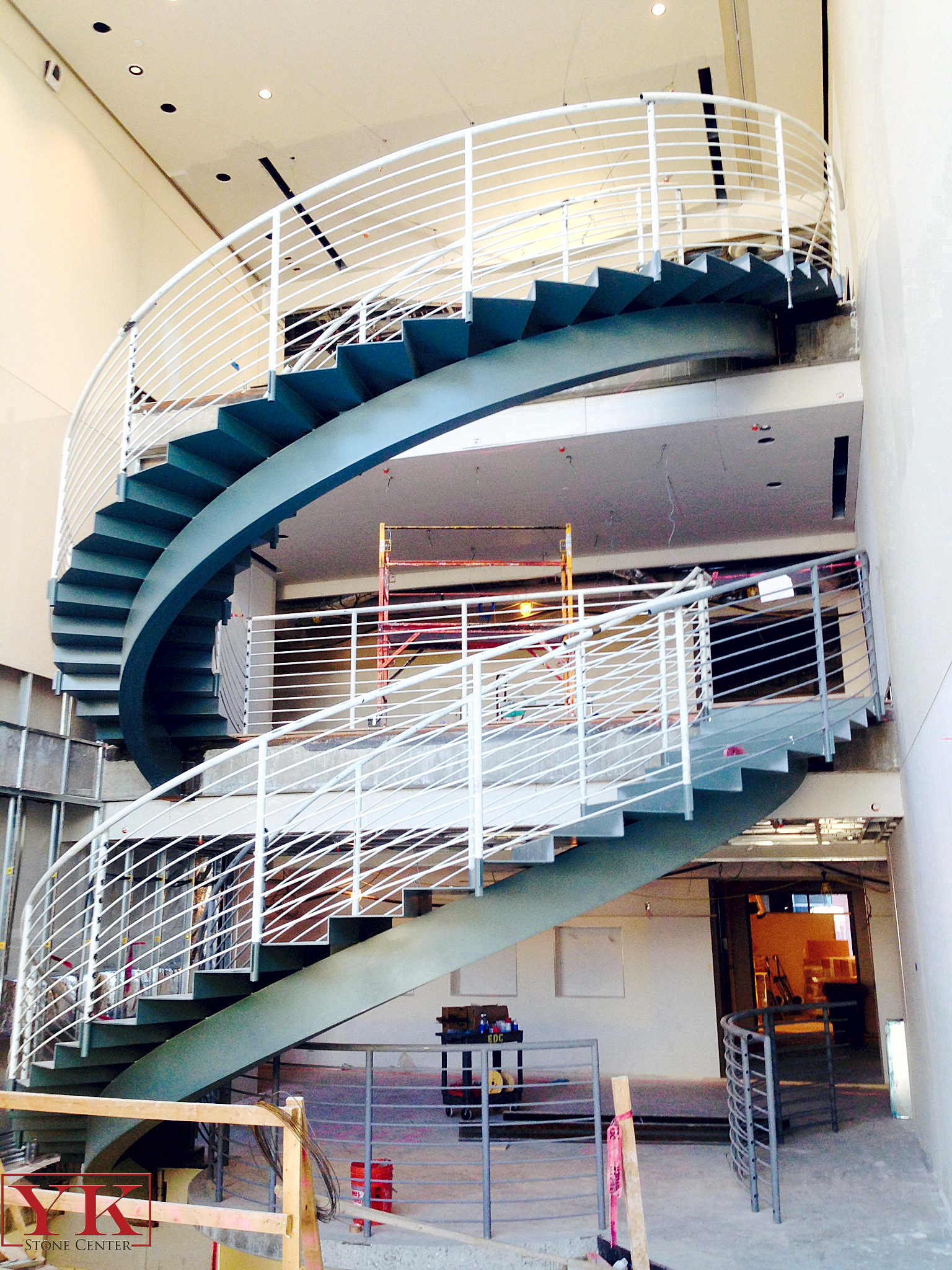 Antero resources spiral stair case, union one station stair case, stone in antero resoures spiral stair case in denver