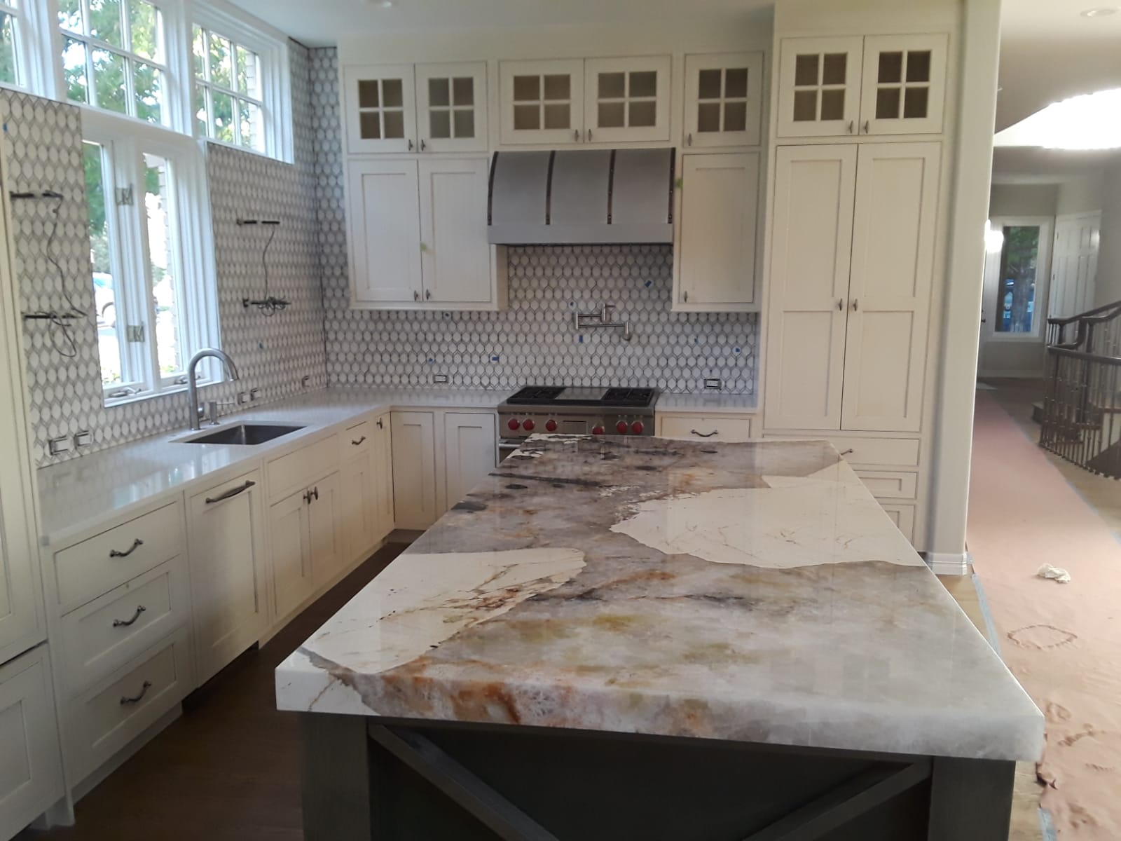 YK Stone Center fabrication shop denver, patagonia kitchen island, glowing quartz stone